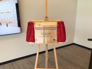 An image of a plaque on a stand commemorating the official opening of the facility